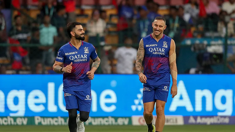 Virat Kohli and Faf du Plessis during warm-up before the match in IPL 2024. AP Photo