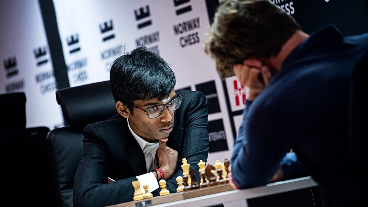 X/NorwayChess : Praggnanandhaa and Carlsen.
