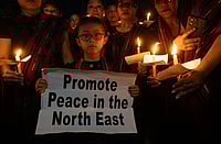 No PM Visit, No Reconciliation Yet: Manipur Mayhem Continues A Year Later Getty Images : Demonstrators carry out a candle light protest over sexual assault case of two Kuki women, during ongoing ethnic clashes in Manipur.