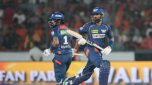 AP Photo/Mahesh Kumar A. : Lucknow Super Giants' Krunal Pandya, right, and captain KL Rahul run between the wickets during the Indian Premier League cricket match between Sunrisers Hyderabad and Lucknow Super Giants in Hyderabad.