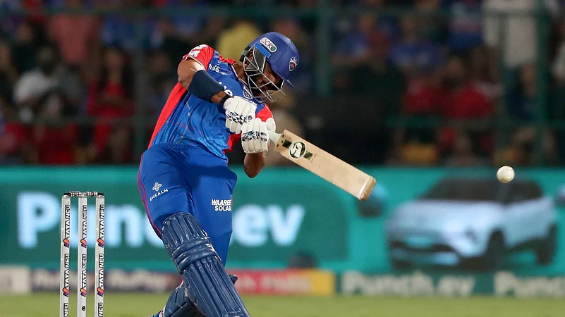 Axar Patel playing a shot against RCB in IPL 2024. AP Photo