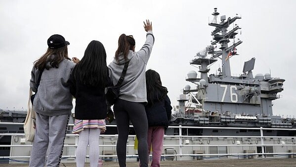 AP : US Navy strike group's flagship aircraft carrier USS Ronald Reagan left Japan after 9 years |