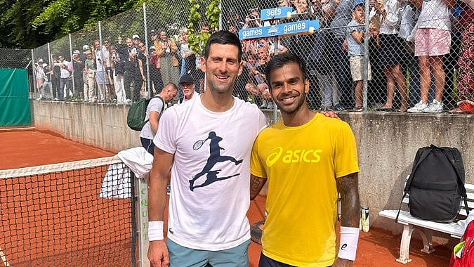 X | Sumit Nagal  : Sumit Nagal (first from right) with Novak Djokovic during the practice session at the clay court of French Open 2024. 