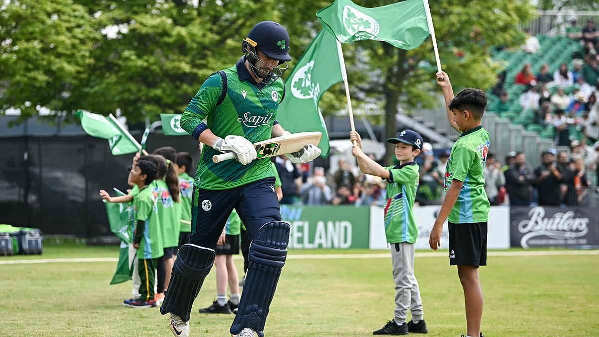 X/@CricketIreland : Irish openers walk out to bat