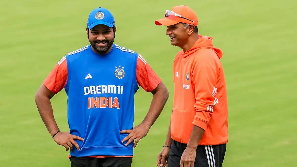 Indian Team head coach Rahul Dravid with skipper Rohit Sharma. - PTI