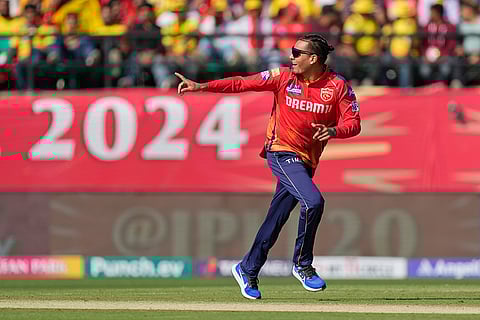 Rahul Chahar celebrates Ruturaj Gaikwad's wicket