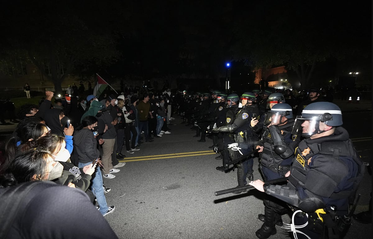 Police in riot gear massed on the UCLA campus and ordered a large group of pro-Palestinian demonstrators inside a fortified encampment to leave the area or face arrest late Wednesday.  - AP
