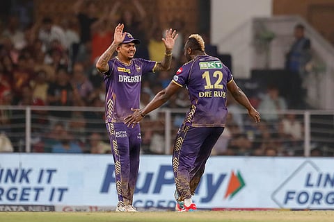Andre Russel, right, celebrates wicket of Nicholas Pooran