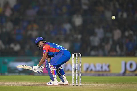 DCs' Kuldeep Yadav plays a shot