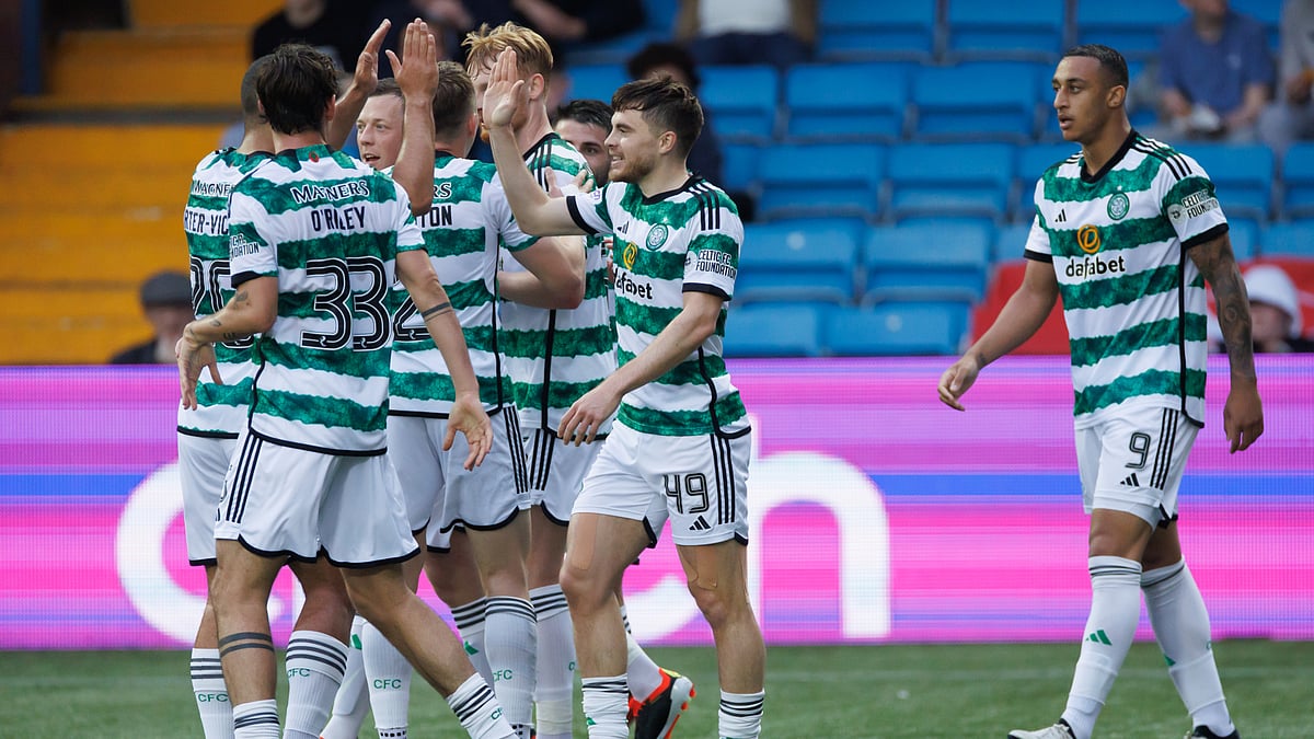 Celtic celebrate after James Forrest scores their third goal against Kilmarnock