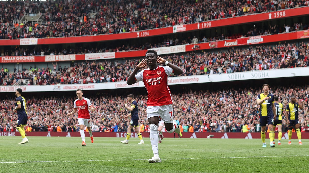 Arsenal's Bukayo Saka celebrates opening the scoring against Bournemouth at the Emirates Stadium in the English Premier League on Saturday (May 4, 2024).