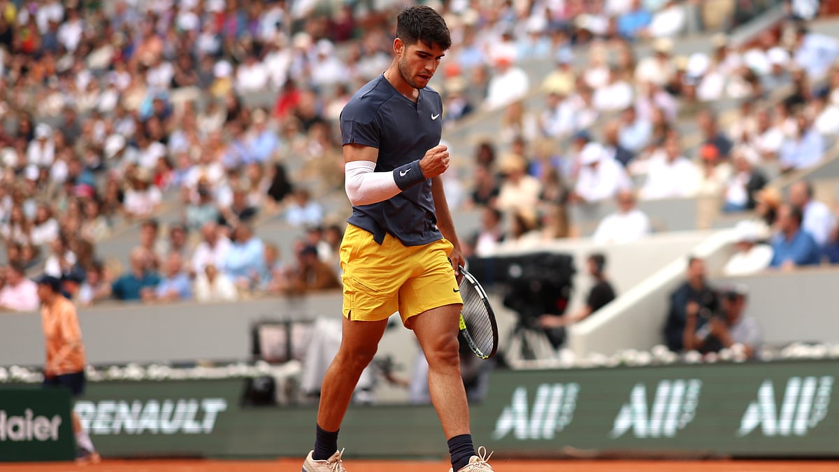 Carlos Alcaraz celebrates a routine first-round win at the French Open on Sunday.