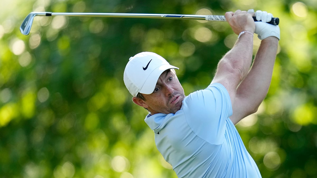 AP : Rory McIlroy, of Northern Ireland, watches his tee shot on the 11th hole during the first round of the PGA Championship golf tournament at the Valhalla Golf Club.