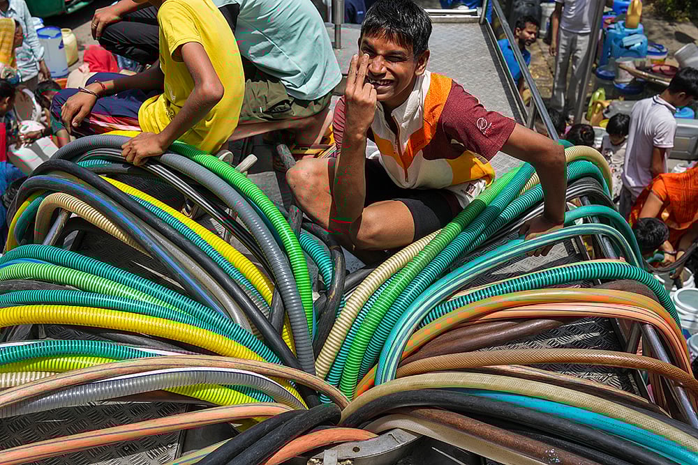 | Photo: PTI/Atul Yadav : Water crisis in Delhi