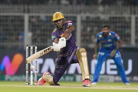 Andre Russell plays a shot