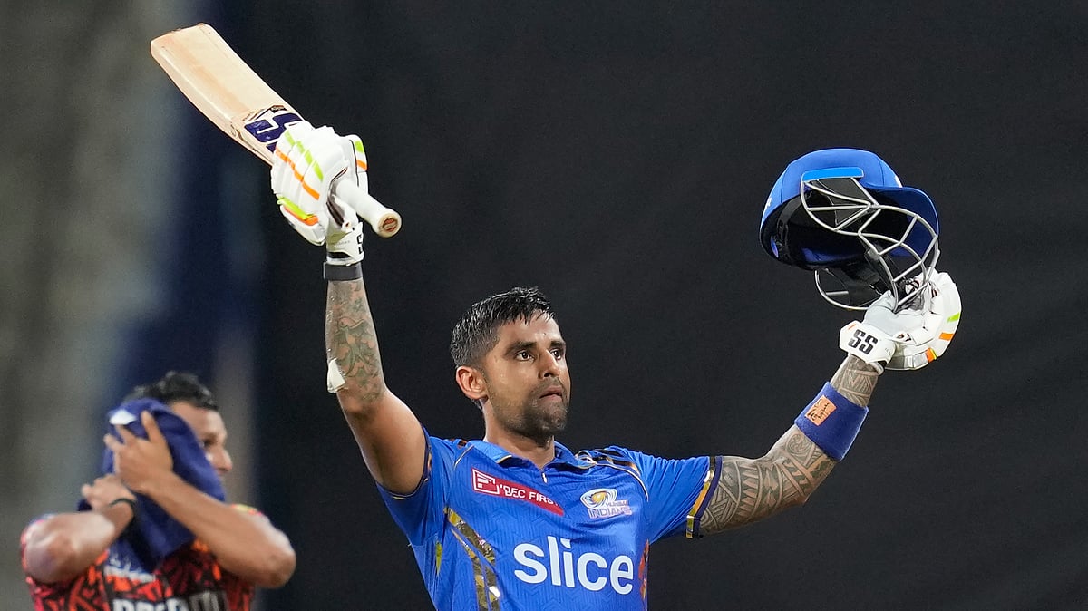 Mumbai Indians' Suryakumar Yadav celebrates his hundred runs during the Indian Premier League cricket match between Mumbai Indians and Sunrisers Hyderabad in Mumbai. - AP Photo/Rajanish Kakade