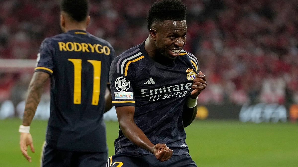 AP : Real Madrid's Vinicius Junior celebrates after scoring his side's opening goal during the Champions League semifinal first leg soccer match between Bayern Munich and Real Madrid.