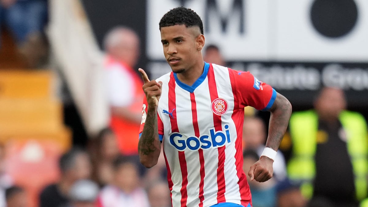 Savio celebrates putting Girona ahead against Valencia.