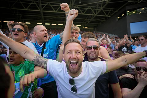 Manchester City fans celebrate team's win