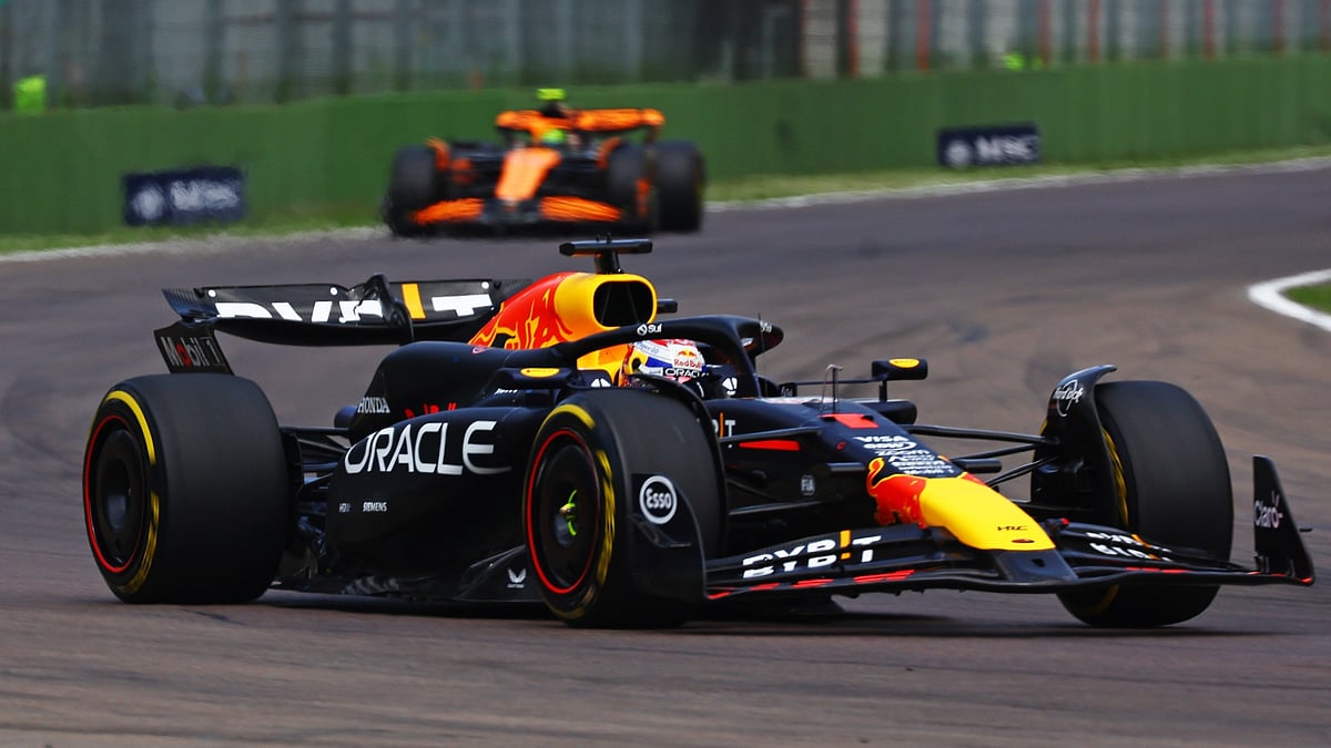 Max Verstappen races away from Lando Norris at the Emilia Romagna Grand Prix.