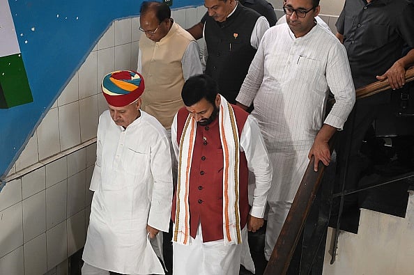 Photo by Parveen Kumar/Hindustan Times via Getty Images) : Chief Minister of Haryana, Nayab Singh Saini and Union Minister of State and BJP Gurugram parliamentary constituency candidate, Rao Inderjit Singh coming out after filing nomination for the Lok Sabha Election