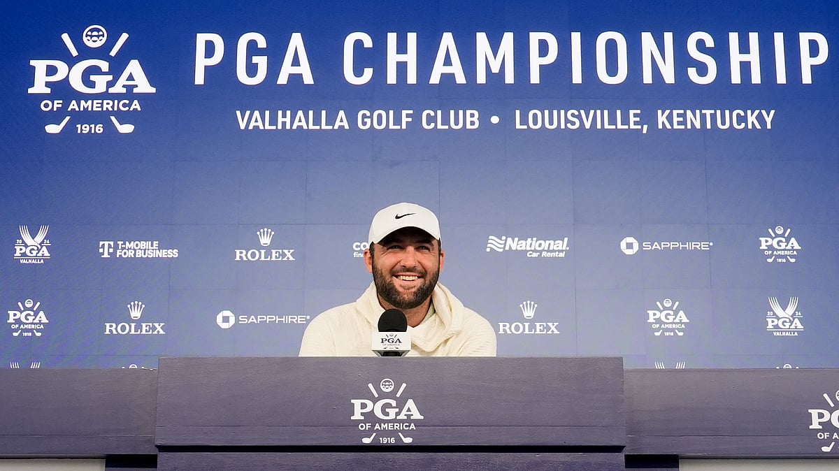AP : Scottie Scheffler speaks during a news conference during the PGA Championship golf tournament at the Valhalla Golf Club.