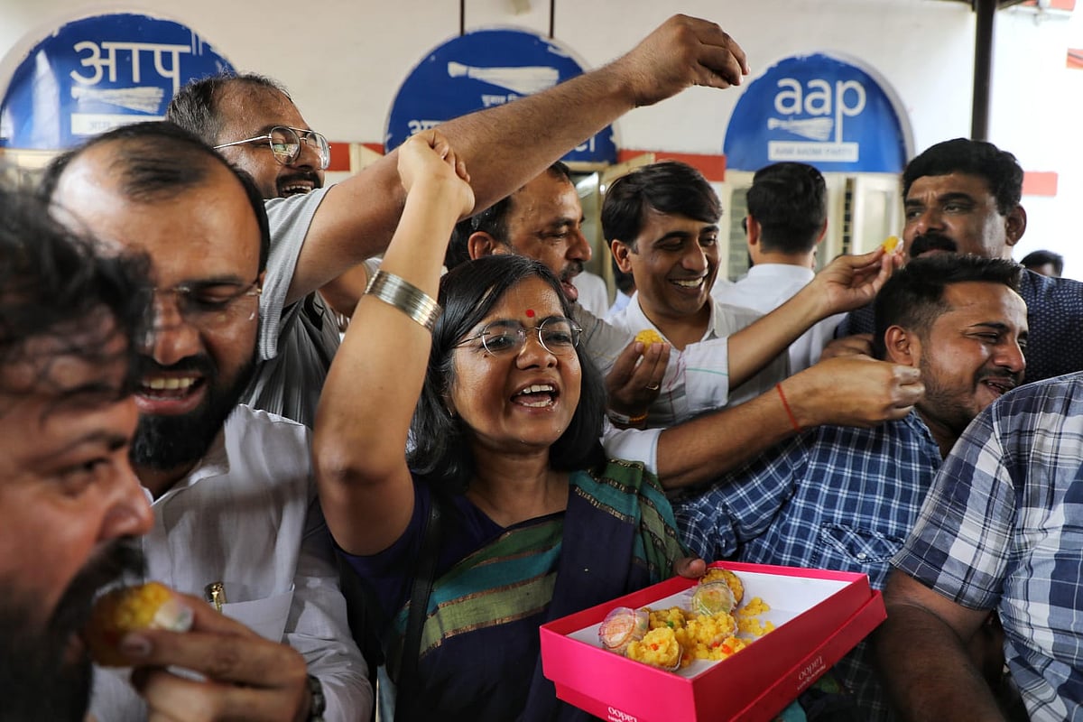 Suresh K Pandey/Outlook : AAP workers, supporters celebrating outside party headquarters in Delhi after SC grants Arvind Kejriwal interim bail