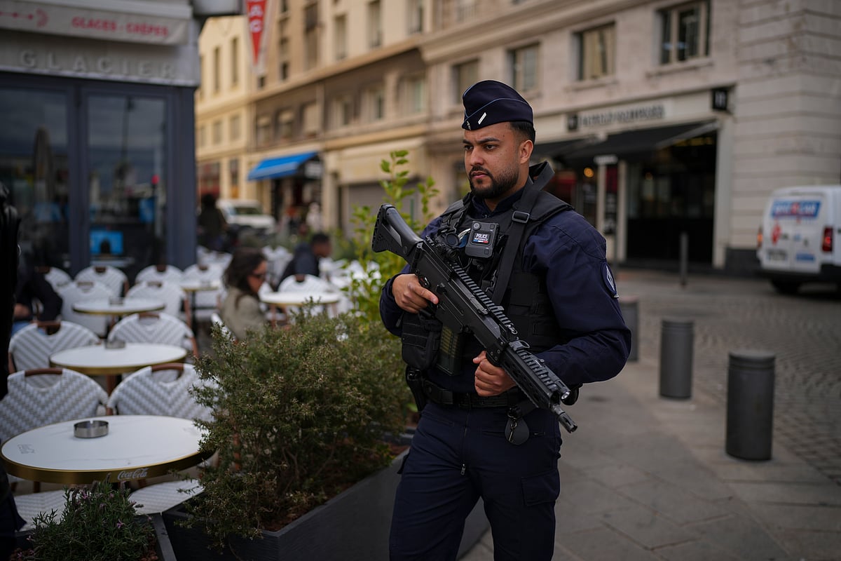 AP : File photo of French police officer patrols the Old Port of Marseille in southern France
