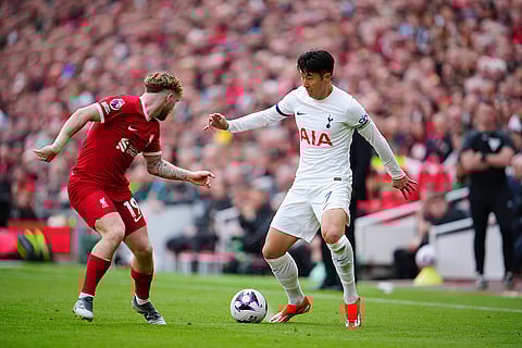 Son Heung-min, right, and Harvey Elliott fight for the ball