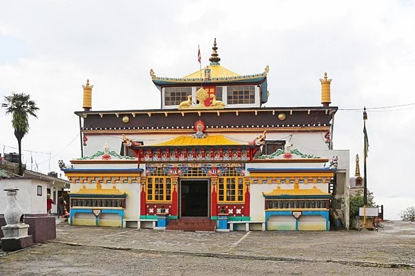 Ghoom Monasterys colorful building with grand roof.