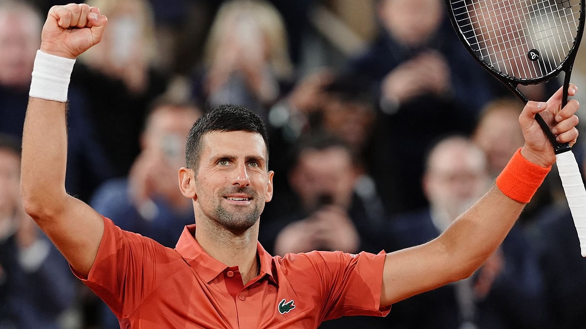 Novak Djokovic is through to round three at Roland Garros for a record 19th time.
