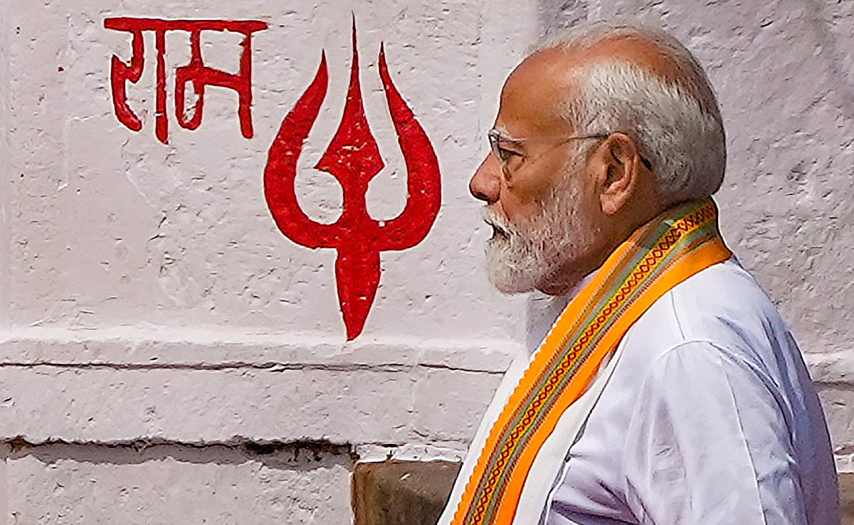 Prime Minister Narendra Modi leaves after performing 'Ganga Poojan' at Dashashwamedh Ghat, in Varanasi, Uttar Pradesh, Tuesday, May 14 - PTI
