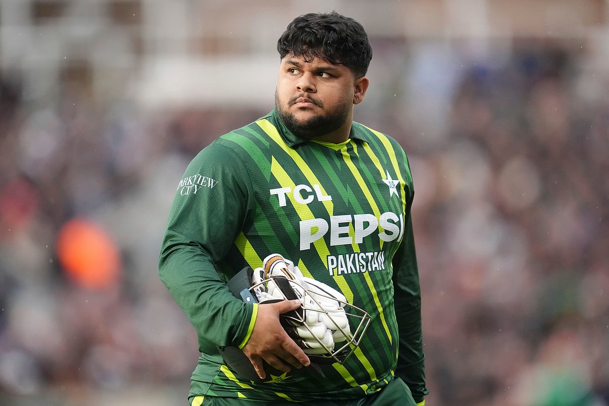 Adam Davy : Pakistan's Azam Khan walks back to the changing rooms after losing his wicket during the fourth IT20 match between England and Pakistan.