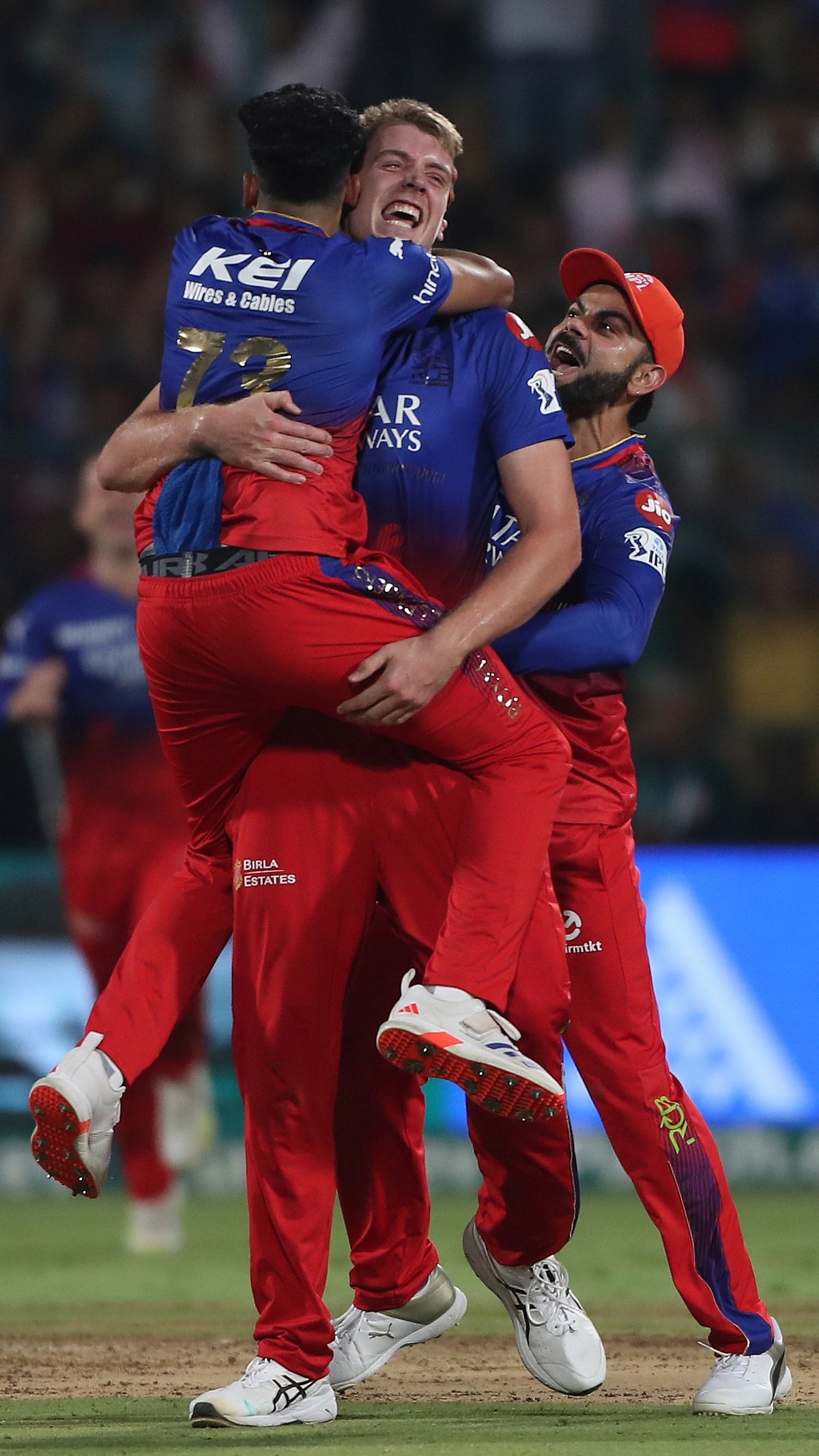 AP Photo : RCB players celebrating after a wicket of DC's Tristan Stubbs.