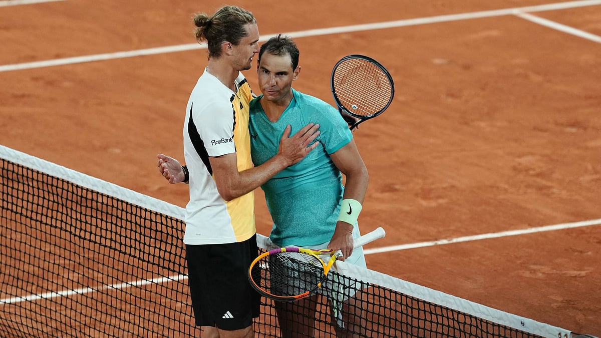 Zverev and Nadal embrace at the conclusion of the match.