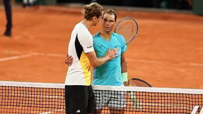 X/rolandgarros : Alexander Zverev with Rafael Nadal after their 1st Round match.