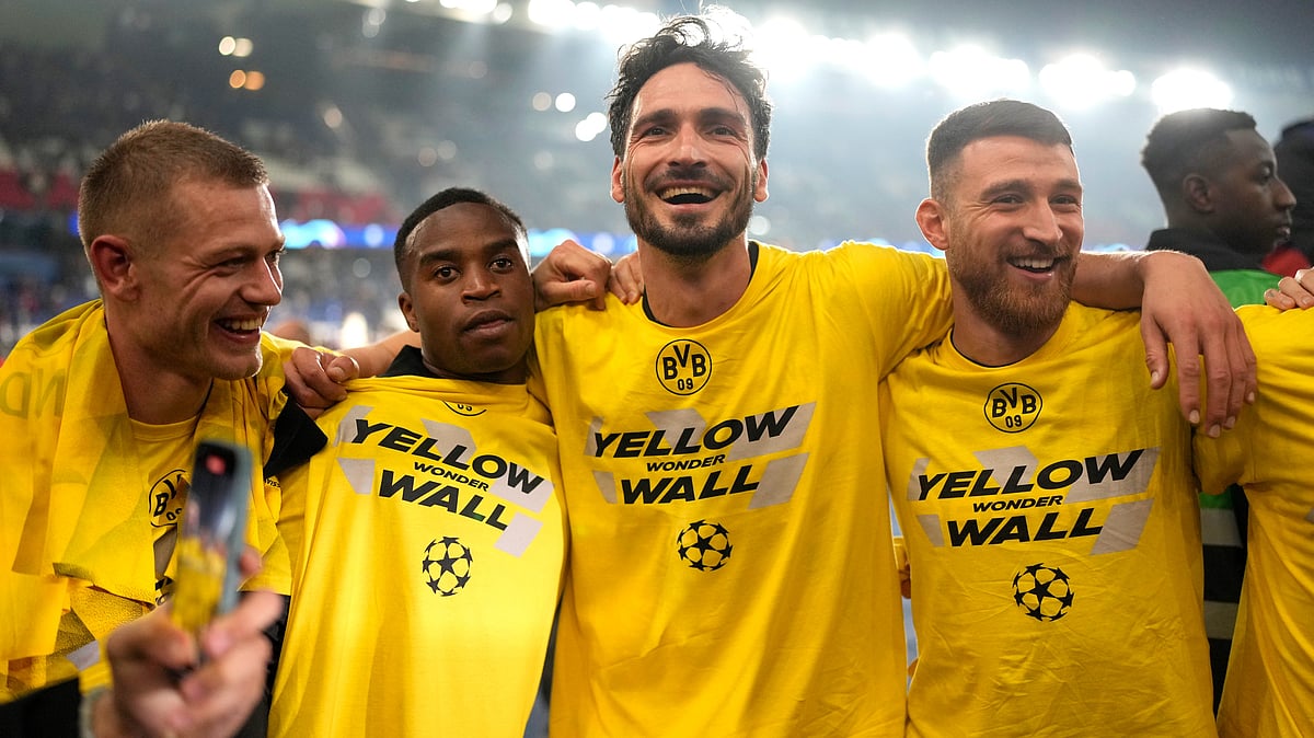 Borussia Dortmund players celebrate at the end of the Champions League semifinal second leg soccer match against Paris Saint-Germain. - AP