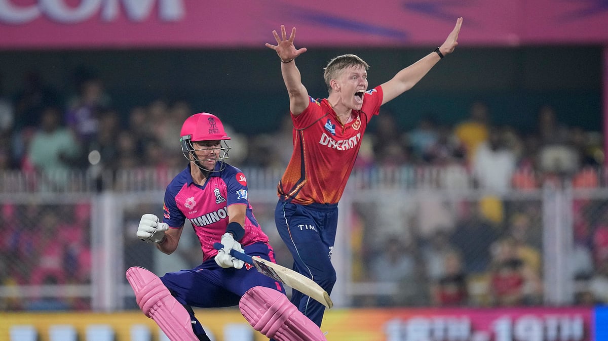 (AP Photo/Anupam Nath)
 : Punjab Kings' Nathan Ellis unsuccessfully appeals for the wicket of Rajasthan Royals' Trent Boult during the Indian Premier League cricket match between Rajasthan Royals and Punjab Kings in Guwahati, India, Wednesday, May. 15, 2023. 
