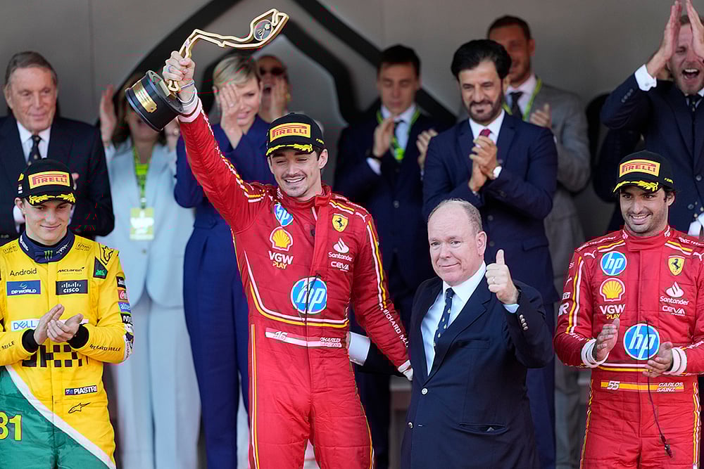 | Photo: AP/Luca Bruno : Charles Leclerc celebrates Monaco Grand Prix win