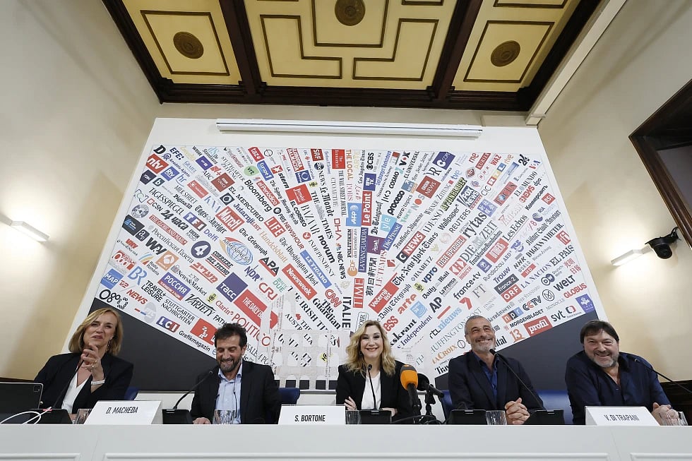 AP : Italian Foreign Press Association’s member Costanze Reuscher hosts a press conference at the Association headquarters in Rome |