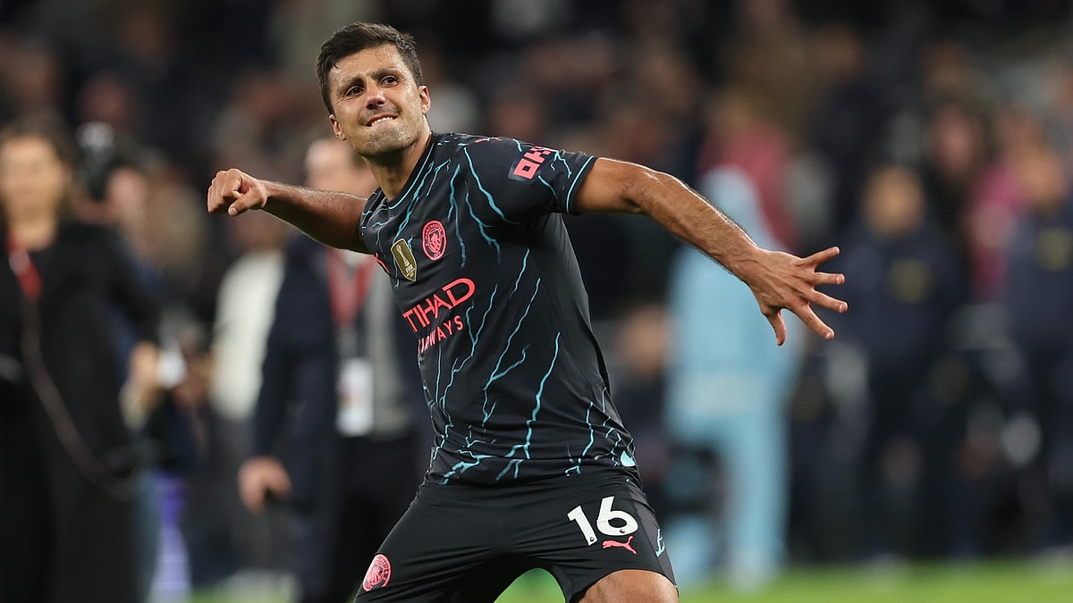 Rodri celebrates Man City's win over Spurs