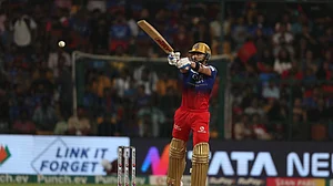 AP Photo : Royal Challengers Bengaluru's Virat Kohli plays a shot during the Indian Premier League cricket match between Royal Challengers Bengaluru and Gujarat Titans in Bengaluru.