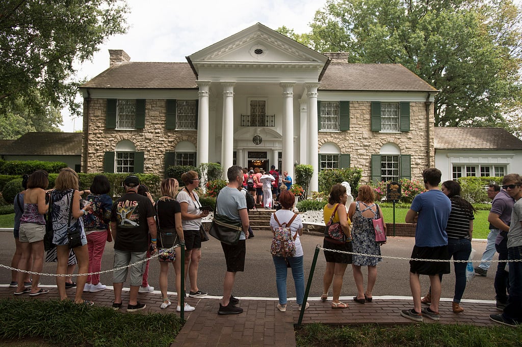 AP : Fans wait in line outside Graceland Tuesday, Aug. 15, 2017, in Memphis, Tenn.