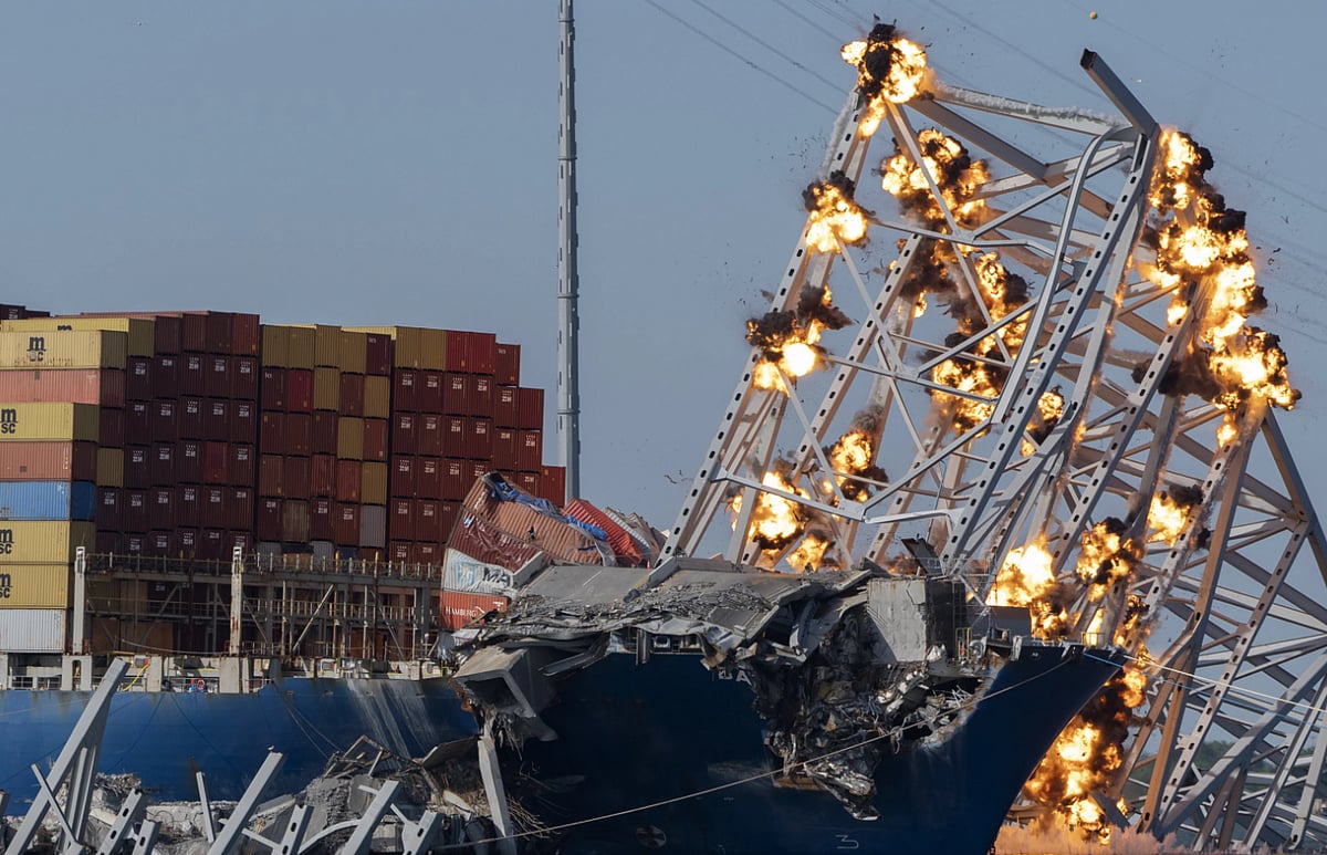 The explosives flashed orange and let off plumes of black smoke upon detonation. - AP