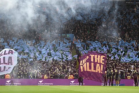 Aston Villa supporters burn flares