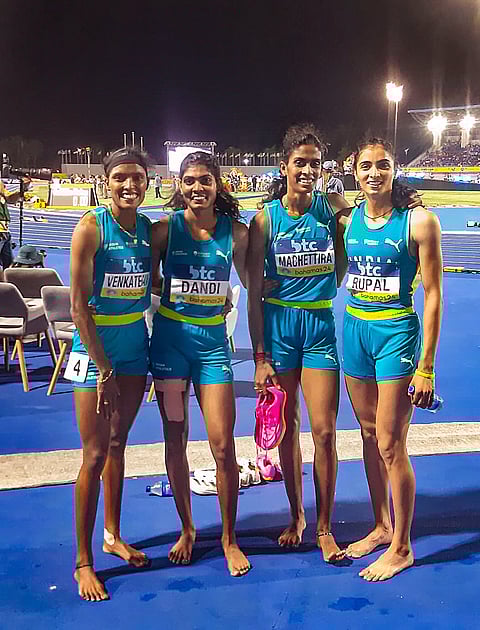Indian women's 4x400m relay team members Rupal Chaudhary, M R Poovamma, Jyothika Sri Dandi and Subha Venkatesan pose for photos after qualifying for Paris Olympics, at the World Athletics Relays, in Nassau, Bahamas, Monday, May 6, 2024.