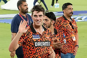 Photo: AP/Mahesh Kumar A. : Sunrisers Hyderabad's captain Pat Cummins
