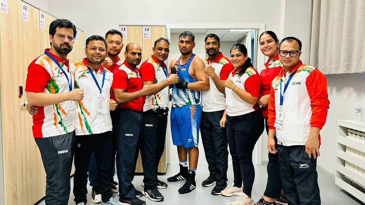 Indian pugilist Gaurav Chauhan (centre) poses with the supporting staff after his win at the Elorda Cup 2024 on Tuesday (May 14). - Boxing Federation of India