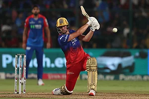 | Photo: AP/Kashif Masood : RCB's Will Jacks plays a shot