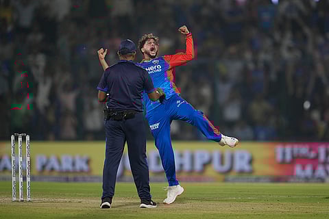 DC bowler Kuldeep Yadav celebrates a wicket